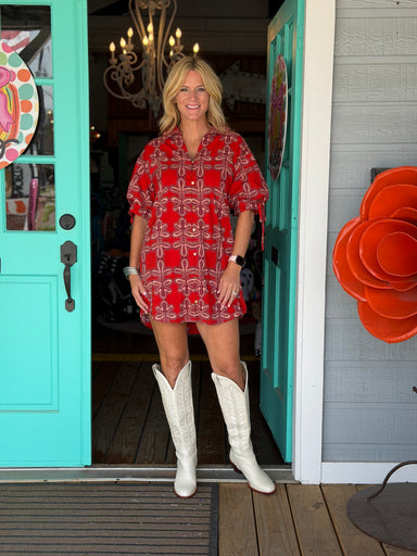 rust colored dress with cream print