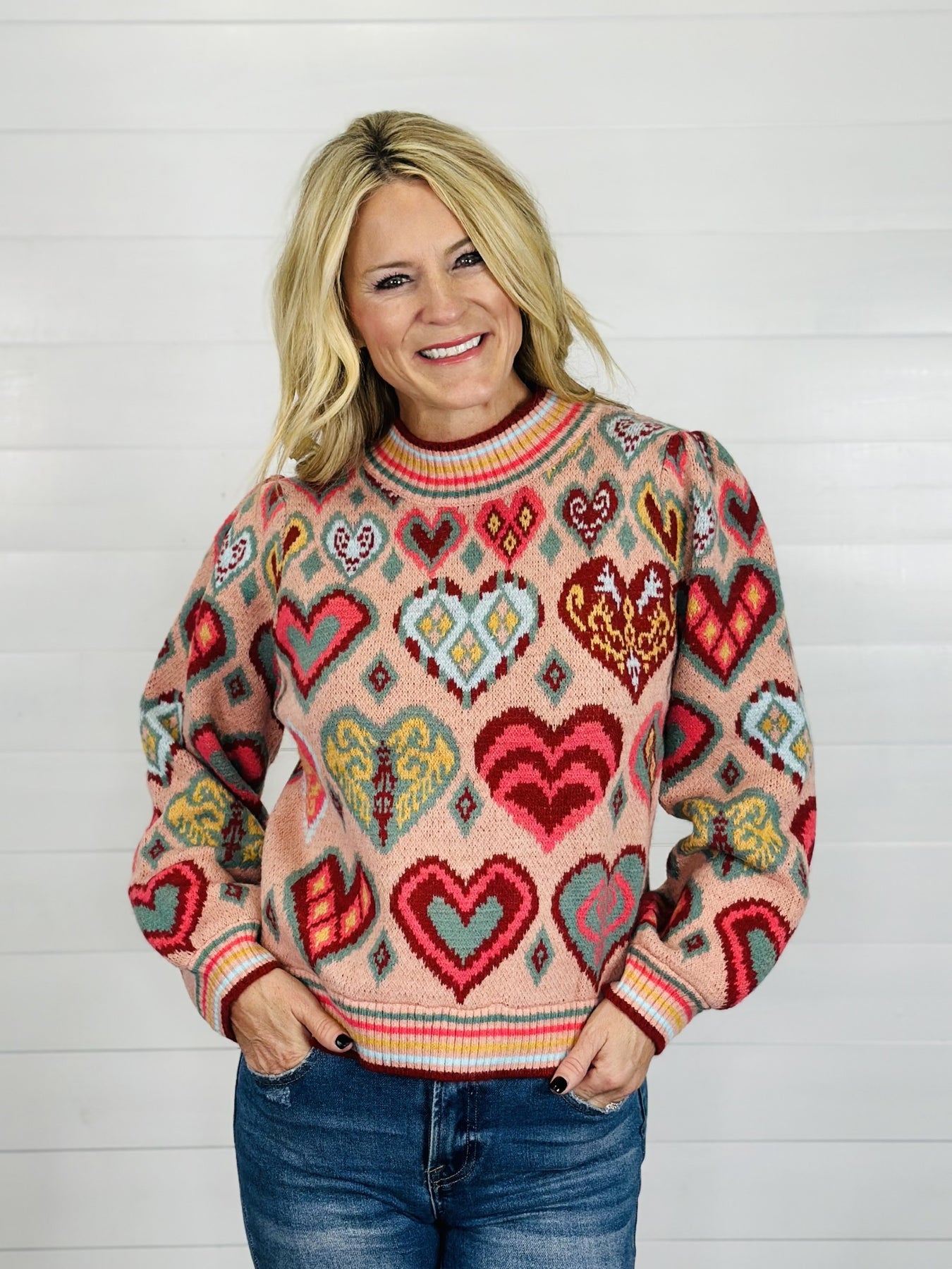 sweater with colorful hearts on it